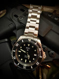 MWC 24 Jewel 300m Automatic Military Divers Watch with Sapphire Crystal and Ceramic Bezel on a Matching Stainless Steel Bracelet